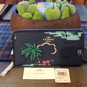 Coach accordion zipper wallet.